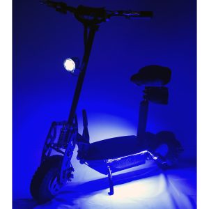 Black scooter with blue LED lights lit in dark