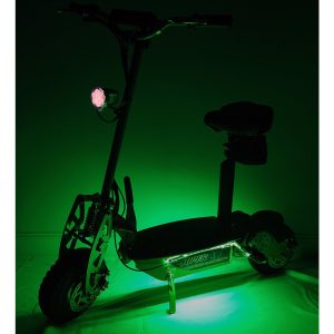 Green scooter with green LED lights lit in dark