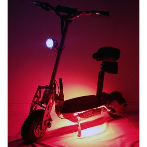 Red scooter with red LED lights lit in dark